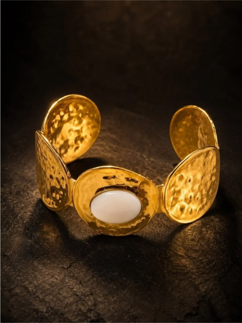 Gold Tone Cuff Bracelet with White Mother-of-Pearl Center